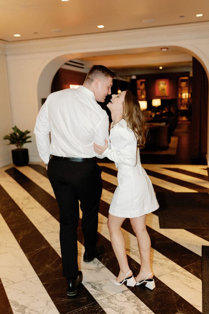 Downtown Chicago engagement photo at Pendry Chicago by Mikayla Scheibe