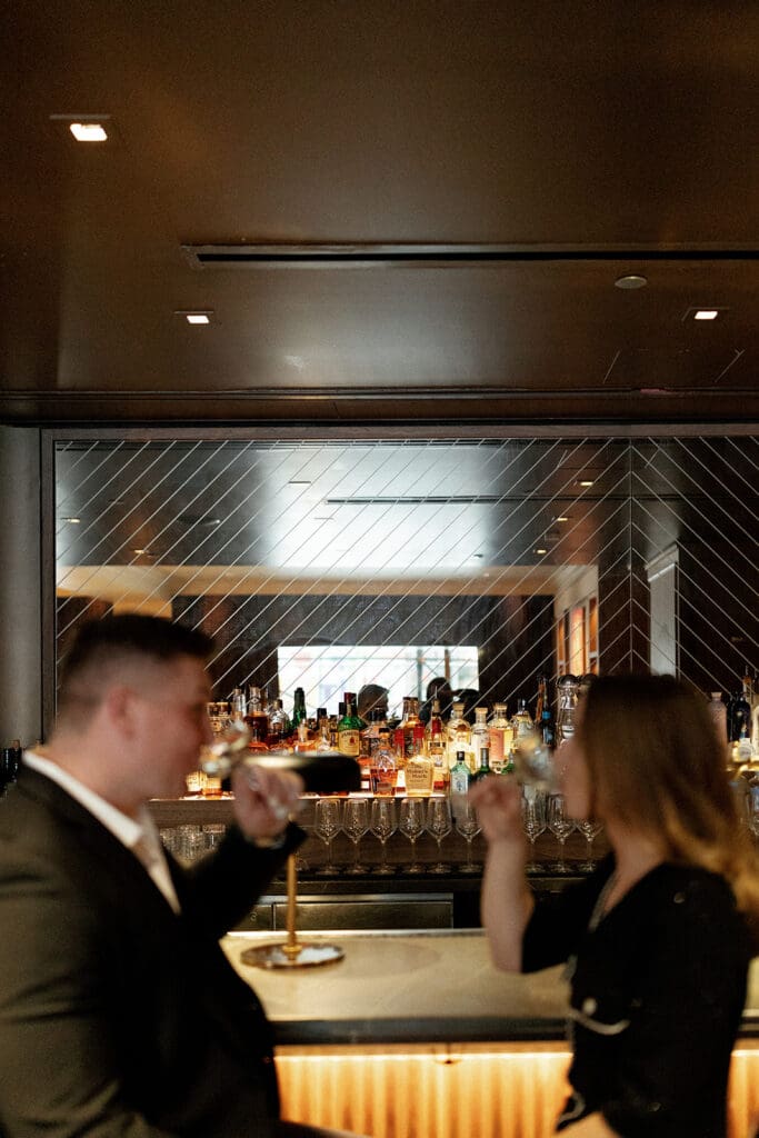 Downtown Chicago engagement photo at Pendry Chicago by Mikayla Scheibe