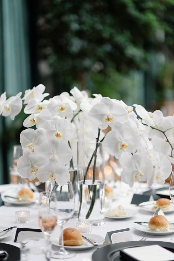 Minimalist Book Tower wedding reception with candlelight