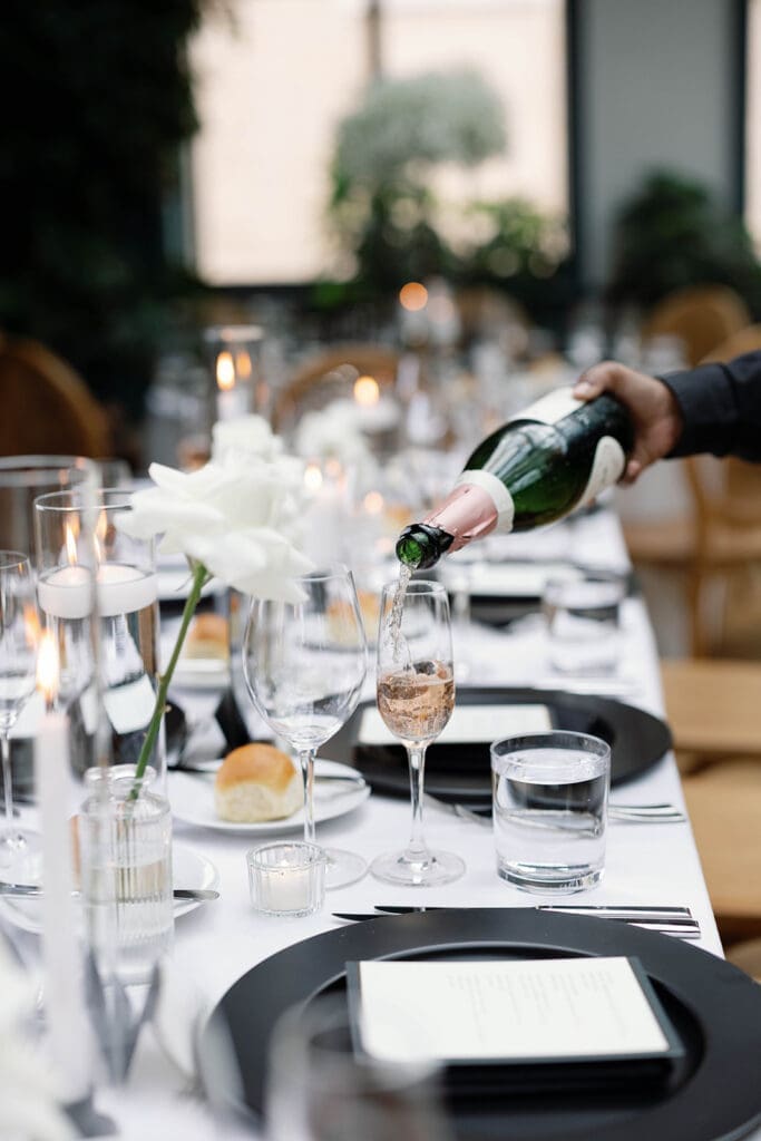 Minimalist Book Tower wedding reception with candlelight